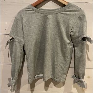 Grey long sleeve shirt with bows on it, brand Truly Me
